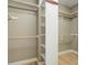 Large walk-in closet with ample shelving and hanging space at 6517 Perry Park Blvd, Larkspur, CO 80118