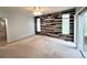 Spacious bedroom featuring natural light, plank accent wall, and ample room for furnishings and relaxation at 588 Stafford Cir, Castle Rock, CO 80104