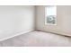 This bedroom has soft carpet and one window allowing ample natural light at 19018 E 94Th Pl, Commerce City, CO 80022