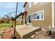 Patio and backyard grass and a wooden fence at 4165 S Granby Cir, Aurora, CO 80014