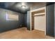 Carpeted bedroom featuring a large closet and a small window that allows for natural light at 1219 Lilac Dr, Lochbuie, CO 80603