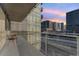 Balcony view of the rail system and cityscape beyond at 1620 Little Raven St # 302, Denver, CO 80202