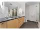 Stylish bathroom features a double vanity, modern fixtures, and tiled shower at 1620 Little Raven St # 302, Denver, CO 80202