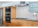 Modern kitchen with stainless steel appliances and gas range at 1620 Little Raven St # 302, Denver, CO 80202