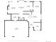 Detailed floor plan showcasing layout of first floor: living, dining, kitchen, and garage at 6002 Alkire Ct, Arvada, CO 80004
