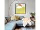 Comfortable living room showcasing stylish decor, a cozy couch, and modern lighting at 6002 Alkire Ct, Arvada, CO 80004