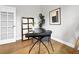 Bright office featuring modern decor, a contemporary desk, and a storage unit at 6002 Alkire Ct, Arvada, CO 80004