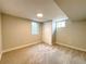 Cozy basement bedroom with carpeted floor, closet, and a window that provides natural light at 1853 S Filbert Ct, Denver, CO 80222