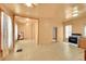 Spacious living room with tile floors, a ceiling fan, and a vintage stove and oven at 1930 E Martin Luther King Jr Blvd, Denver, CO 80205