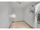 Small room featuring bright walls, minimal decor, and natural light from a window at 1930 E Martin Luther King Jr Blvd, Denver, CO 80205
