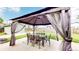 Backyard patio area with a large gazebo, perfect for outdoor dining and entertaining with backyard view at 41 S Fenton St, Lakewood, CO 80226