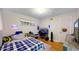 A playful bedroom design with a colorful theme, including a large bed and modern computer setup at 41 S Fenton St, Lakewood, CO 80226