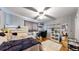 Bright bedroom featuring a cozy bed, wooden dresser, and a spacious layout perfect for relaxing and rest at 41 S Fenton St, Lakewood, CO 80226