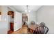 Cozy dining area featuring wood floors, a chandelier, and classic furniture at 41 S Fenton St, Lakewood, CO 80226