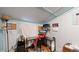 Bright office space featuring a blue painted wall, desk, and organized shelving for productivity at 41 S Fenton St, Lakewood, CO 80226
