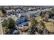 Aerial view of a residential neighborhood showcasing homes with well-maintained yards at 23525 Painted Hills St, Parker, CO 80138