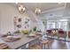 Open-concept dining area with stylish decor and comfortable seating at 1212 Sugarloaf Ln, Erie, CO 80516