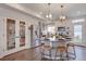 Bright kitchen features a large island, stainless steel appliances, and ample cabinet space at 1212 Sugarloaf Ln, Erie, CO 80516
