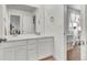 Double vanity bathroom with a mirror at 1210 Horsetail Loop, Elizabeth, CO 80107