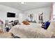 Main bedroom with a walk-in closet and a sitting area at 1210 Horsetail Loop, Elizabeth, CO 80107