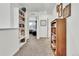 Bright hallway with built-in bookshelves at 1210 Horsetail Loop, Elizabeth, CO 80107