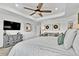 Spacious main bedroom with tray ceiling and ample closet space at 1210 Horsetail Loop, Elizabeth, CO 80107