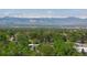 Distant view of the mountains showcases its location in a scenic area with snow-capped peaks at 3560 S Glencoe St, Denver, CO 80237