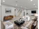 Bright living room with modern furniture, neutral color palette, and decorative accents for a cozy atmosphere at 3560 S Glencoe St, Denver, CO 80237