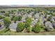 Beautiful aerial view of a mature residential neighborhood with abundant greenery and manicured lawns at 6230 Snowberry Ave, Firestone, CO 80504