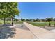 Scenic community park with walking paths, picnic benches, and open green spaces for residents to enjoy at 6230 Snowberry Ave, Firestone, CO 80504