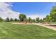 Community playground and park offers slides, swings, and fun play areas on a sunny day at 6230 Snowberry Ave, Firestone, CO 80504