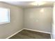 Cozy room features vinyl flooring, neutral walls, and natural lighting at 1299 S Brentwood Way, Lakewood, CO 80232