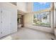 Spacious living room with large windows offering natural light and views at 13762 E Lehigh Ave # G, Aurora, CO 80014