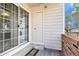 Outdoor patio with sliding glass door, laundry machines, brick siding and exterior storage at 13762 E Lehigh Ave # G, Aurora, CO 80014