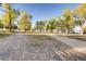 Scenic walking paths winding through lush green trees at 13762 E Lehigh Ave # G, Aurora, CO 80014