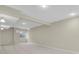 Unfinished basement showing neutral walls and new carpet at 21684 Swale Ave, Parker, CO 80138