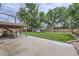 Large backyard with patio area and lush green lawn at 845 S 9Th Ave, Brighton, CO 80601