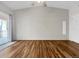 Bright bedroom with hardwood floors, a sliding glass door and lots of natural light at 1703 Whitehall Dr # 5I, Longmont, CO 80504