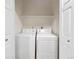 Laundry room featuring a full size washer and dryer and a single shelf at 1703 Whitehall Dr # 5I, Longmont, CO 80504