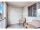This balcony offers a relaxing outdoor retreat with comfortable seating and a view at 12555 E Tennessee Cir # 302, Aurora, CO 80012
