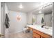 Bathroom with tile floor, a mirror over the sink and a toilet at 12555 E Tennessee Cir # 302, Aurora, CO 80012