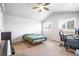 Spacious bedroom featuring carpet, vaulted ceiling, and windows for natural light at 12555 E Tennessee Cir # 302, Aurora, CO 80012