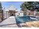 Outdoor community pool area includes fencing, furniture, and pergola, promising a relaxing and private spot at 12555 E Tennessee Cir # 302, Aurora, CO 80012