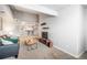 Inviting living room with open floorplan that leads to the kitchen and dining areas at 12555 E Tennessee Cir # 302, Aurora, CO 80012