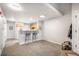 Spacious living room that transitions seamlessly to the kitchen and dining bar at 12555 E Tennessee Cir # 302, Aurora, CO 80012