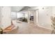Inviting living room with neutral carpet and gray walls that highlight the open floorplan at 12555 E Tennessee Cir # 302, Aurora, CO 80012
