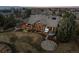 Aerial view of home displaying backyard, landscaping, and surrounding neighborhood at 8912 Little Raven Trl, Niwot, CO 80503