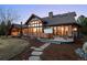 Home exterior showcases a hot tub and picturesque landscaping at 8912 Little Raven Trl, Niwot, CO 80503