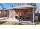 Covered outdoor patio area perfect for entertaining or relaxing at 1560 Hudson St, Denver, CO 80220