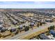 Wide aerial view of a neighborhood showcasing the community layout at 19302 E 58Th Pl, Aurora, CO 80019